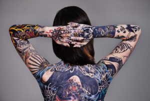 girl covered in tattoos