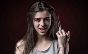 teen girl with heroin needle