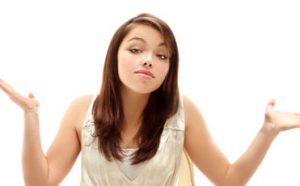 teen girl shrugging her sholders