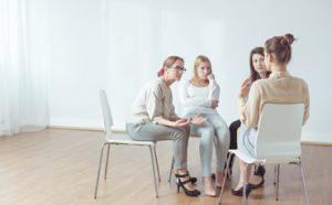 women in a support group